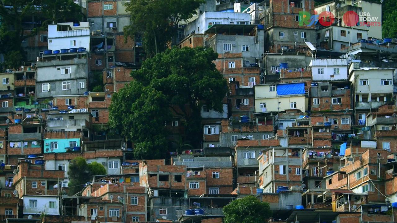 College student volunteers help build first playground in impoverished Rio favela
